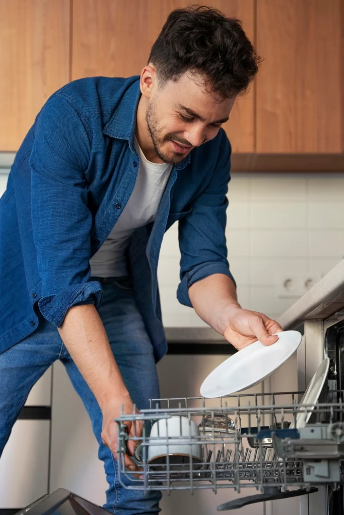 man-cleaning-dishwasher